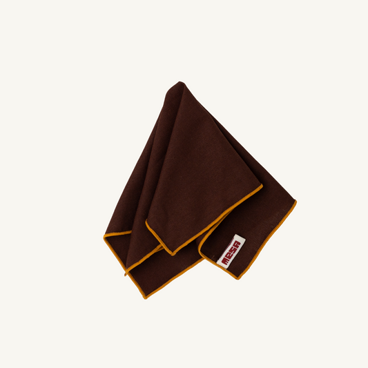 wood napkin with caramel trim