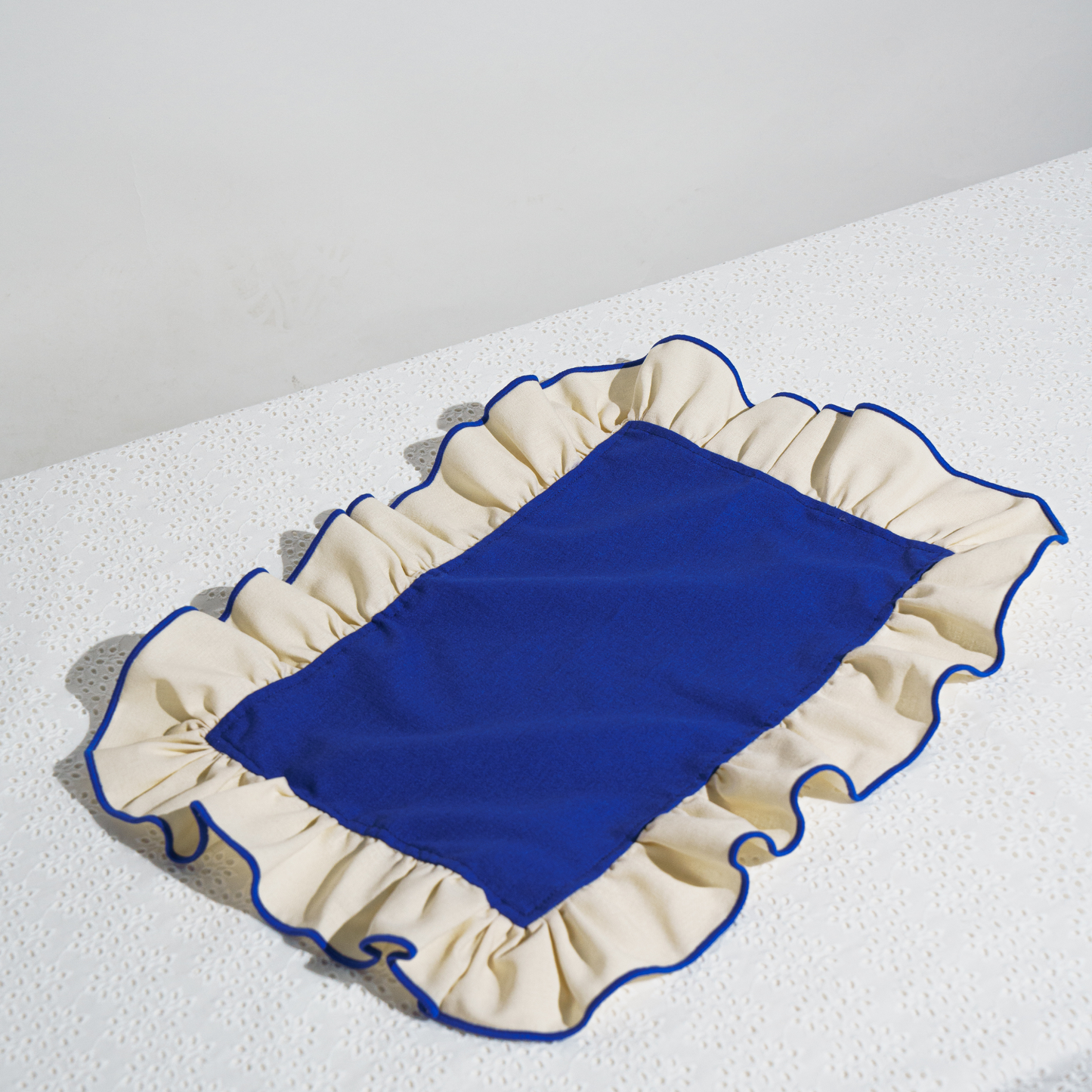ruffled placemat royal blue & cream